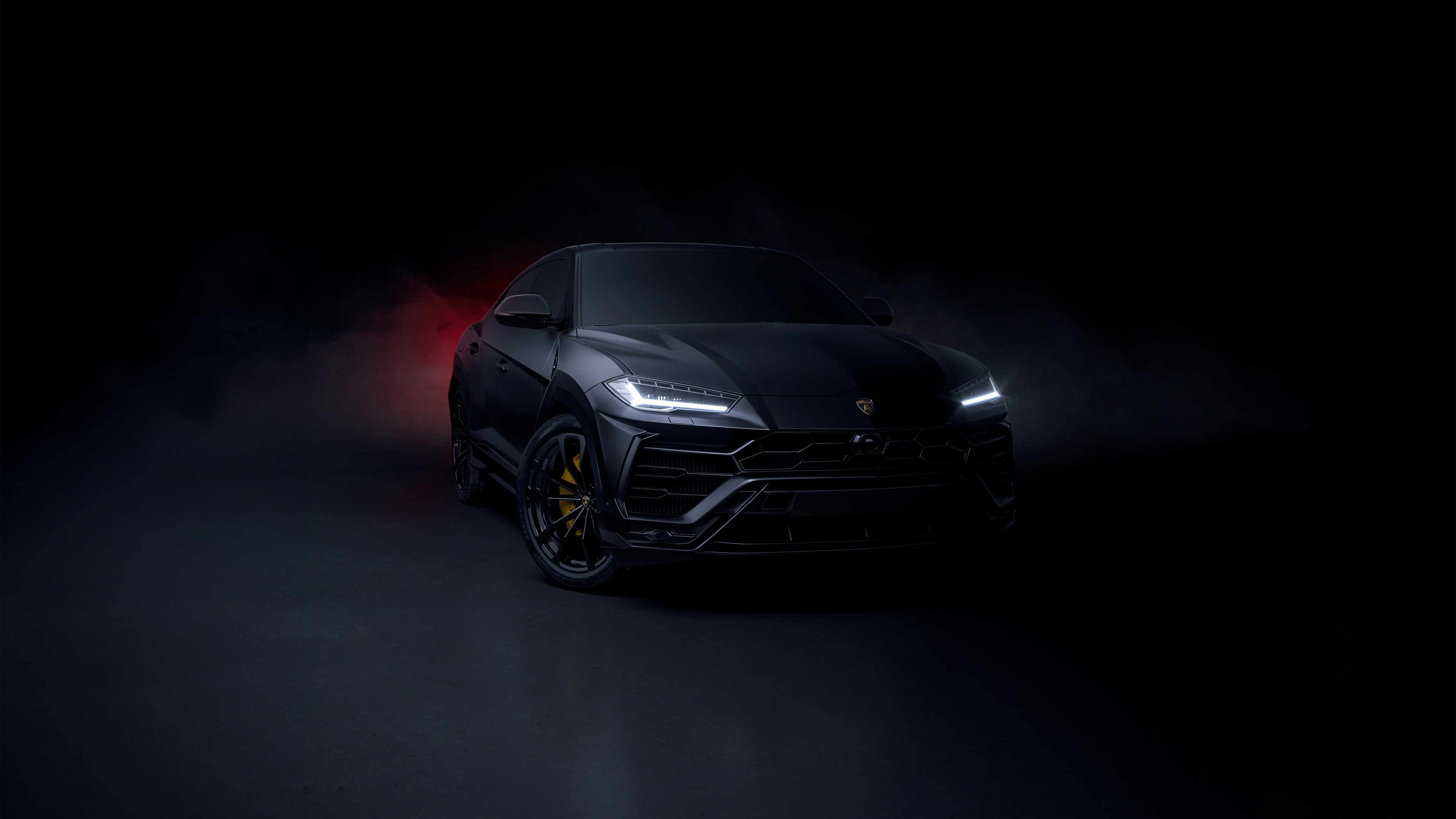 Lamborghini Urus in dramatic studio lighting